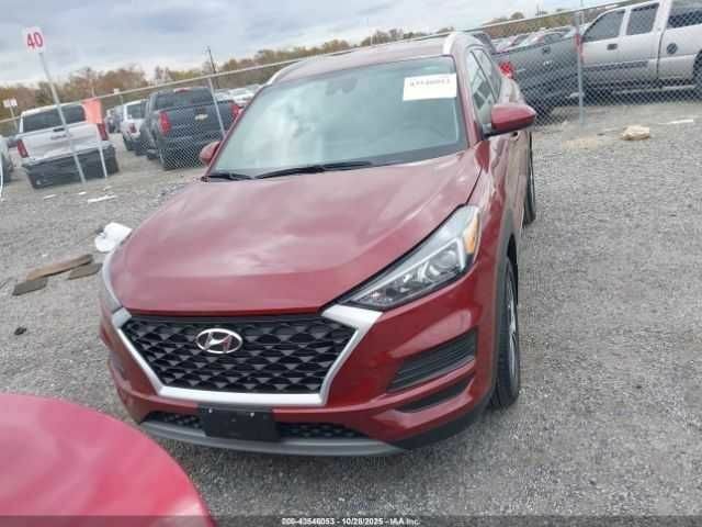 Красный Хендай Туксон, объемом двигателя 2.4 л и пробегом 12 тыс. км за 12000 $, фото 1 на Automoto.ua