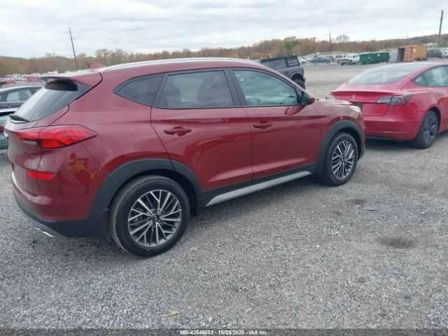 Красный Хендай Туксон, объемом двигателя 2.4 л и пробегом 12 тыс. км за 12000 $, фото 5 на Automoto.ua