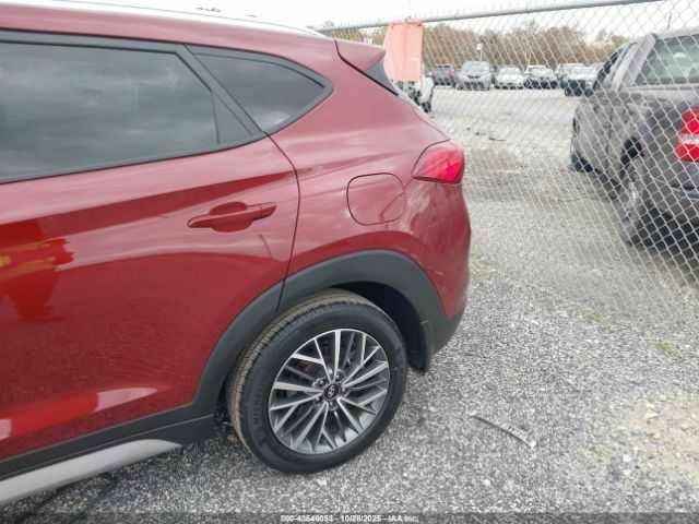 Красный Хендай Туксон, объемом двигателя 2.4 л и пробегом 12 тыс. км за 12000 $, фото 7 на Automoto.ua