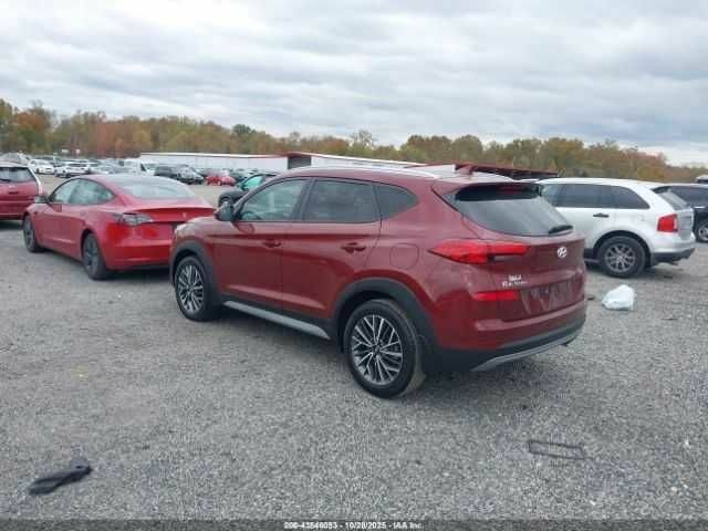 Красный Хендай Туксон, объемом двигателя 2.4 л и пробегом 12 тыс. км за 12000 $, фото 3 на Automoto.ua