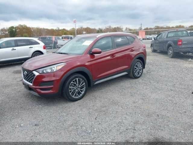 Красный Хендай Туксон, объемом двигателя 2.4 л и пробегом 12 тыс. км за 12000 $, фото 2 на Automoto.ua