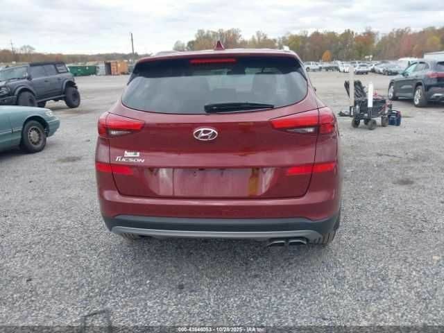 Красный Хендай Туксон, объемом двигателя 2.4 л и пробегом 12 тыс. км за 12000 $, фото 4 на Automoto.ua