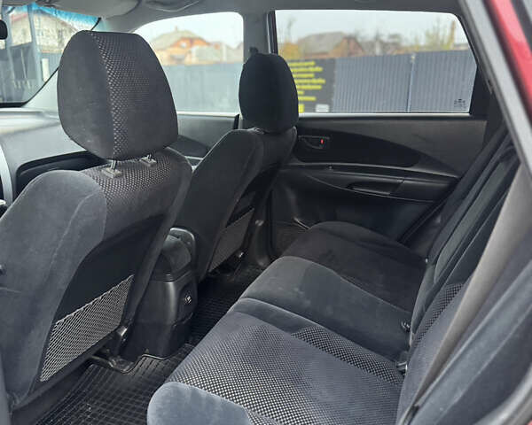 Красный Хендай Туксон, объемом двигателя 2 л и пробегом 255 тыс. км за 6999 $, фото 14 на Automoto.ua