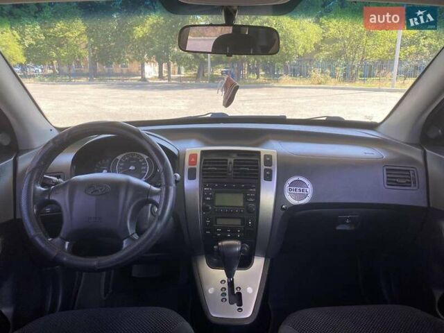 Червоний Хендай Туксон, об'ємом двигуна 1.99 л та пробігом 246 тис. км за 8200 $, фото 27 на Automoto.ua