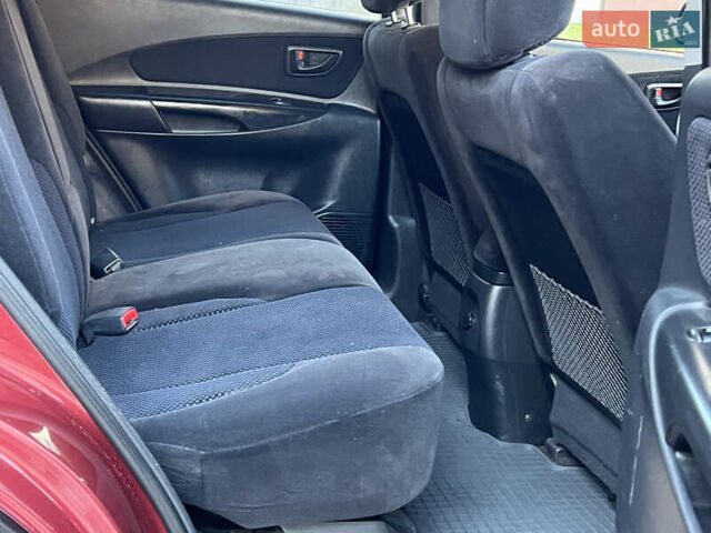 Червоний Хендай Туксон, об'ємом двигуна 2 л та пробігом 228 тис. км за 5999 $, фото 39 на Automoto.ua