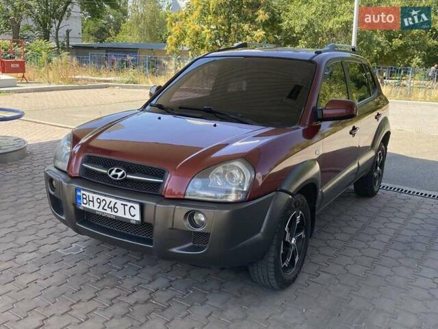 Червоний Хендай Туксон, об'ємом двигуна 1.99 л та пробігом 246 тис. км за 8200 $, фото 2 на Automoto.ua