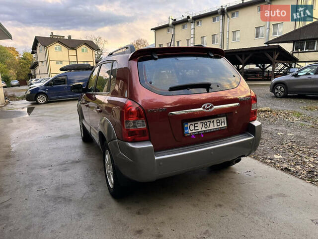 Красный Хендай Туксон, объемом двигателя 1.99 л и пробегом 145 тыс. км за 7999 $, фото 14 на Automoto.ua