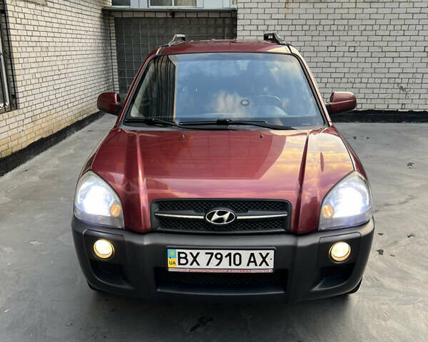 Красный Хендай Туксон, объемом двигателя 1.98 л и пробегом 160 тыс. км за 7900 $, фото 18 на Automoto.ua
