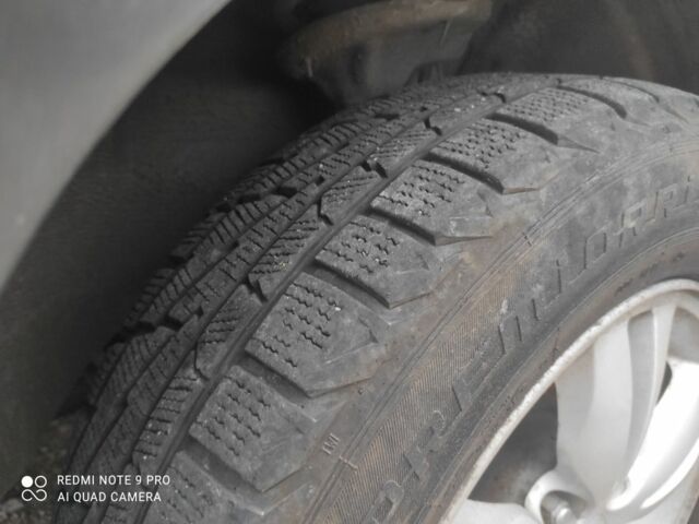 Красный Хендай Туксон, объемом двигателя 2 л и пробегом 207 тыс. км за 8479 $, фото 8 на Automoto.ua