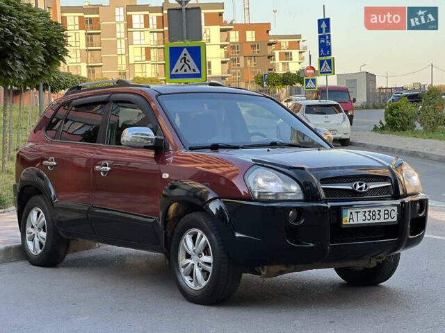 Червоний Хендай Туксон, об'ємом двигуна 2 л та пробігом 228 тис. км за 5999 $, фото 7 на Automoto.ua