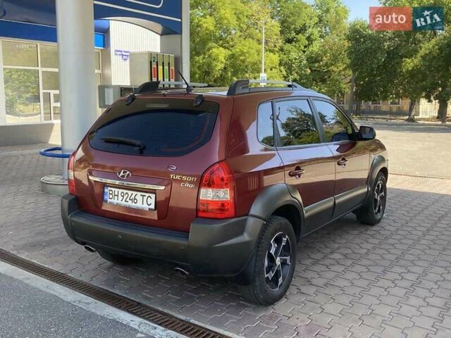 Червоний Хендай Туксон, об'ємом двигуна 1.99 л та пробігом 246 тис. км за 8200 $, фото 10 на Automoto.ua
