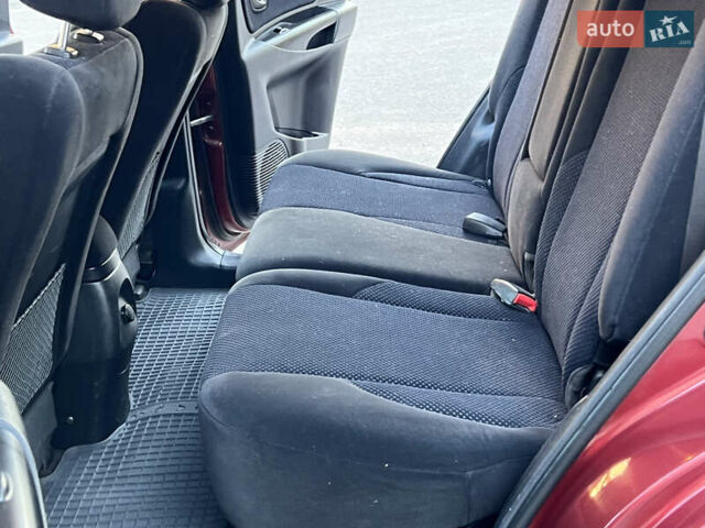 Червоний Хендай Туксон, об'ємом двигуна 2 л та пробігом 228 тис. км за 5999 $, фото 43 на Automoto.ua