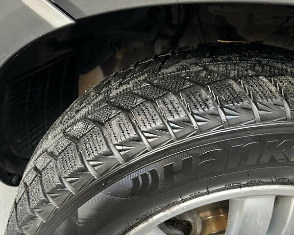 Красный Хендай Туксон, объемом двигателя 1.98 л и пробегом 160 тыс. км за 7900 $, фото 15 на Automoto.ua