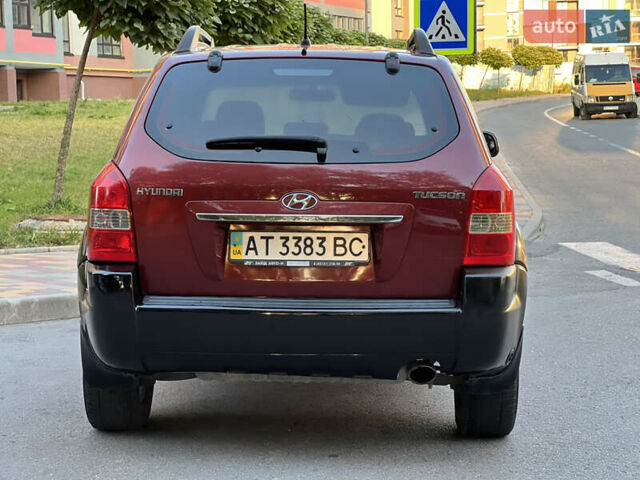 Червоний Хендай Туксон, об'ємом двигуна 2 л та пробігом 228 тис. км за 5999 $, фото 21 на Automoto.ua