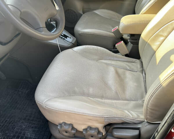 Красный Хендай Туксон, объемом двигателя 1.98 л и пробегом 132 тыс. км за 7850 $, фото 10 на Automoto.ua