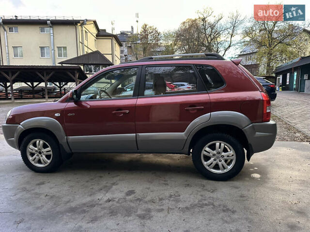 Красный Хендай Туксон, объемом двигателя 1.99 л и пробегом 145 тыс. км за 7999 $, фото 17 на Automoto.ua