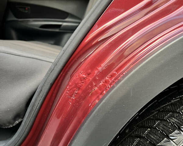 Красный Хендай Туксон, объемом двигателя 1.98 л и пробегом 160 тыс. км за 7900 $, фото 17 на Automoto.ua