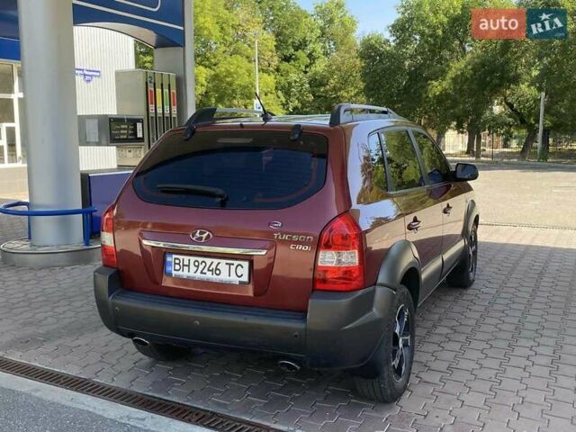 Червоний Хендай Туксон, об'ємом двигуна 1.99 л та пробігом 246 тис. км за 8200 $, фото 11 на Automoto.ua
