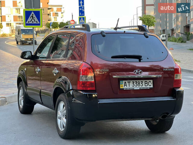 Червоний Хендай Туксон, об'ємом двигуна 2 л та пробігом 228 тис. км за 5999 $, фото 18 на Automoto.ua