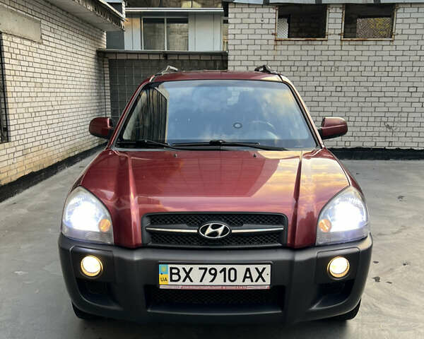 Красный Хендай Туксон, объемом двигателя 1.98 л и пробегом 160 тыс. км за 7900 $, фото 20 на Automoto.ua