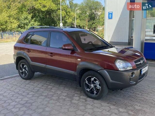 Червоний Хендай Туксон, об'ємом двигуна 1.99 л та пробігом 246 тис. км за 8200 $, фото 7 на Automoto.ua