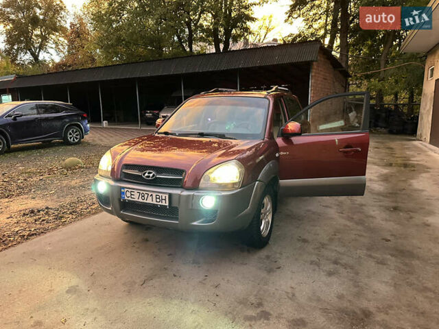 Красный Хендай Туксон, объемом двигателя 1.99 л и пробегом 145 тыс. км за 7999 $, фото 37 на Automoto.ua