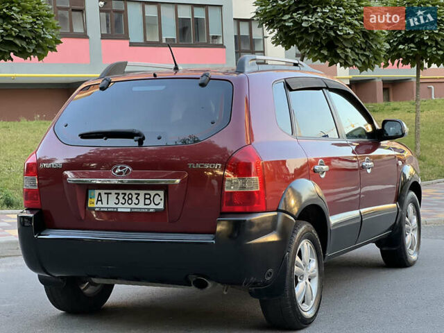 Червоний Хендай Туксон, об'ємом двигуна 2 л та пробігом 228 тис. км за 5999 $, фото 22 на Automoto.ua