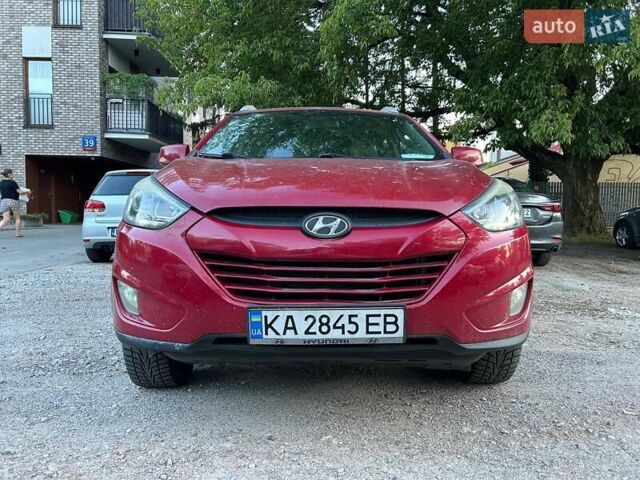 Червоний Хендай Туксон, об'ємом двигуна 2.4 л та пробігом 187 тис. км за 11500 $, фото 4 на Automoto.ua