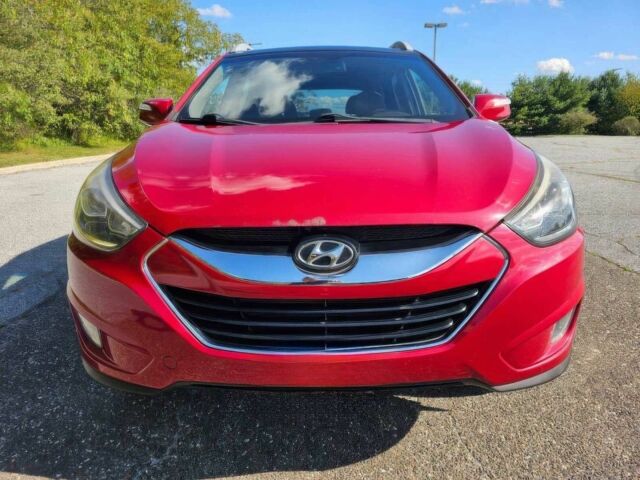 Червоний Хендай Туксон, об'ємом двигуна 2.4 л та пробігом 85 тис. км за 13100 $, фото 1 на Automoto.ua