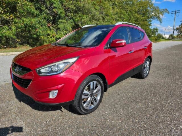 Червоний Хендай Туксон, об'ємом двигуна 2.4 л та пробігом 85 тис. км за 13100 $, фото 2 на Automoto.ua