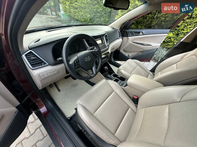 Червоний Хендай Туксон, об'ємом двигуна 2 л та пробігом 170 тис. км за 17999 $, фото 47 на Automoto.ua
