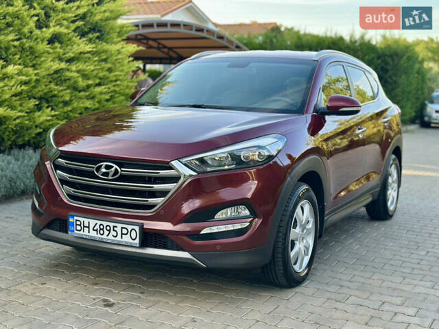 Червоний Хендай Туксон, об'ємом двигуна 2 л та пробігом 170 тис. км за 17999 $, фото 14 на Automoto.ua