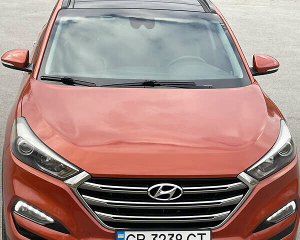 Красный Хендай Туксон, объемом двигателя 1.59 л и пробегом 123 тыс. км за 14600 $, фото 2 на Automoto.ua