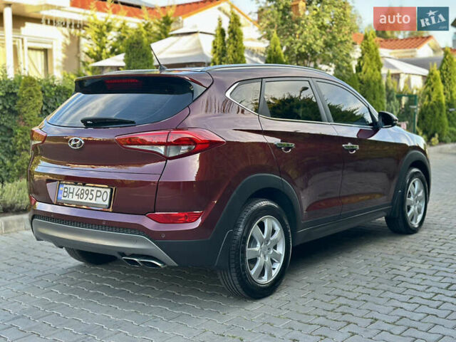 Червоний Хендай Туксон, об'ємом двигуна 2 л та пробігом 170 тис. км за 17999 $, фото 12 на Automoto.ua