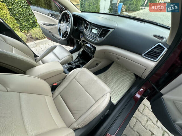 Червоний Хендай Туксон, об'ємом двигуна 2 л та пробігом 170 тис. км за 17999 $, фото 38 на Automoto.ua