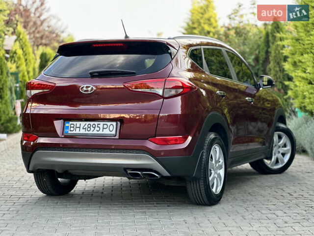 Червоний Хендай Туксон, об'ємом двигуна 2 л та пробігом 170 тис. км за 17999 $, фото 3 на Automoto.ua