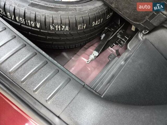 Красный Хендай Туксон, объемом двигателя 2 л и пробегом 97 тыс. км за 20500 $, фото 13 на Automoto.ua