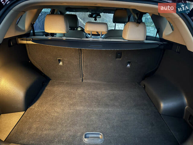 Красный Хендай Туксон, объемом двигателя 2 л и пробегом 110 тыс. км за 17000 $, фото 10 на Automoto.ua