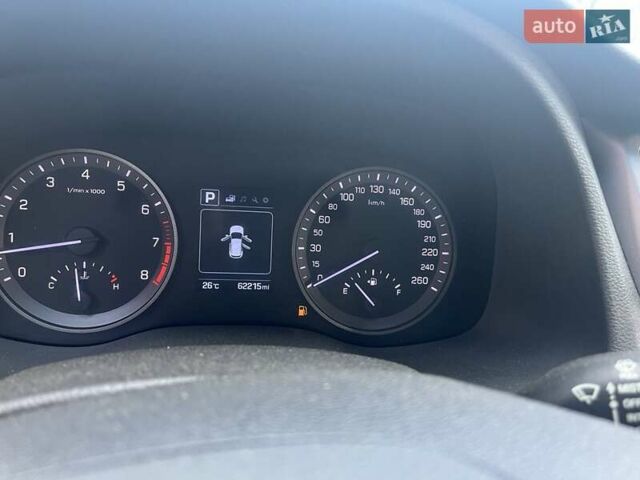 Червоний Хендай Туксон, об'ємом двигуна 2 л та пробігом 101 тис. км за 15700 $, фото 13 на Automoto.ua