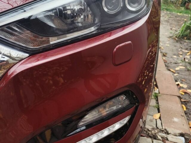 Червоний Хендай Туксон, об'ємом двигуна 2 л та пробігом 110 тис. км за 19800 $, фото 11 на Automoto.ua