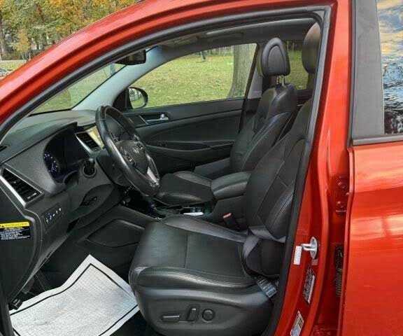 Червоний Хендай Туксон, об'ємом двигуна 1.6 л та пробігом 72 тис. км за 15500 $, фото 8 на Automoto.ua