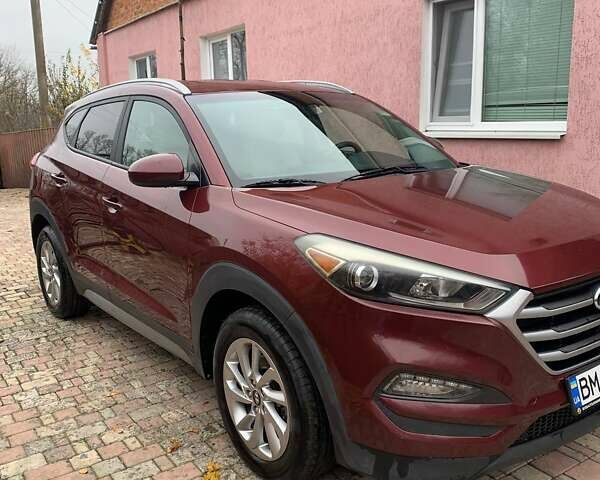 Красный Хендай Туксон, объемом двигателя 2 л и пробегом 123 тыс. км за 15300 $, фото 2 на Automoto.ua