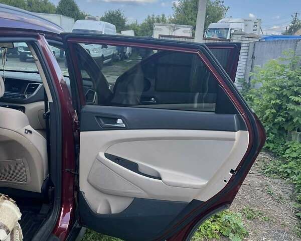 Червоний Хендай Туксон, об'ємом двигуна 2 л та пробігом 101 тис. км за 15700 $, фото 18 на Automoto.ua