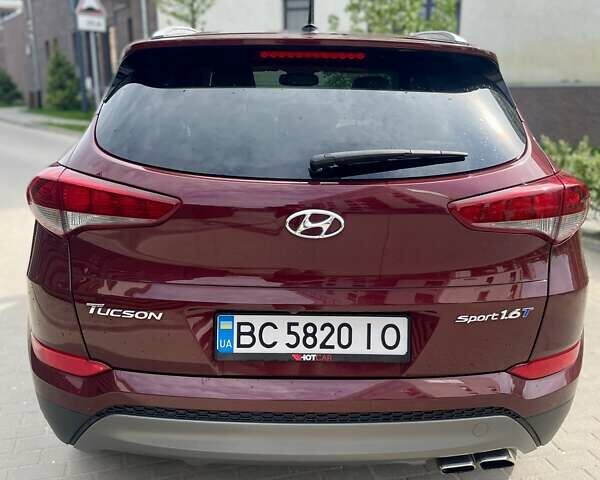 Красный Хендай Туксон, объемом двигателя 1.6 л и пробегом 65 тыс. км за 15500 $, фото 5 на Automoto.ua