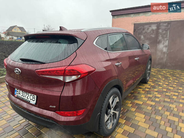Красный Хендай Туксон, объемом двигателя 2 л и пробегом 110 тыс. км за 17000 $, фото 6 на Automoto.ua