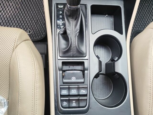 Червоний Хендай Туксон, об'ємом двигуна 2 л та пробігом 110 тис. км за 19800 $, фото 17 на Automoto.ua