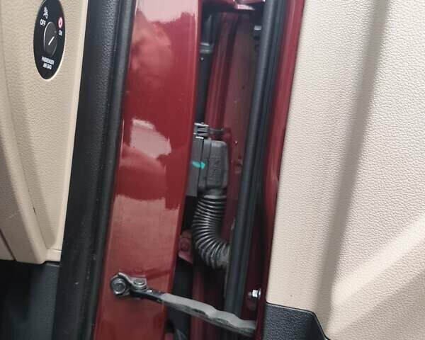 Красный Хендай Туксон, объемом двигателя 2.02 л и пробегом 110 тыс. км за 19800 $, фото 13 на Automoto.ua