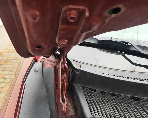 Красный Хендай Туксон, объемом двигателя 2.02 л и пробегом 110 тыс. км за 19800 $, фото 77 на Automoto.ua