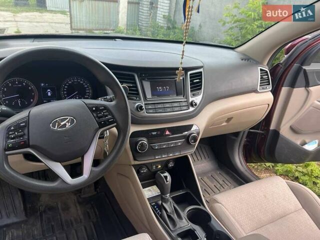 Червоний Хендай Туксон, об'ємом двигуна 2 л та пробігом 101 тис. км за 15700 $, фото 10 на Automoto.ua