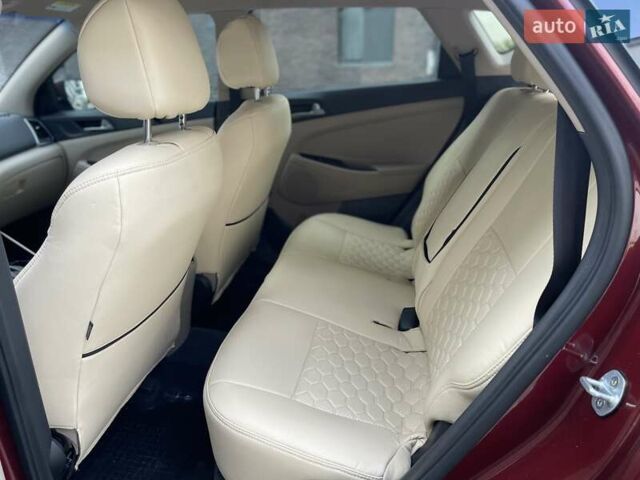 Красный Хендай Туксон, объемом двигателя 1.6 л и пробегом 65 тыс. км за 15500 $, фото 15 на Automoto.ua